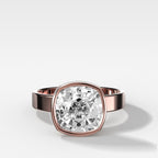 Finest Bezel Set Engagement Ring With Cushion Cut Diamond