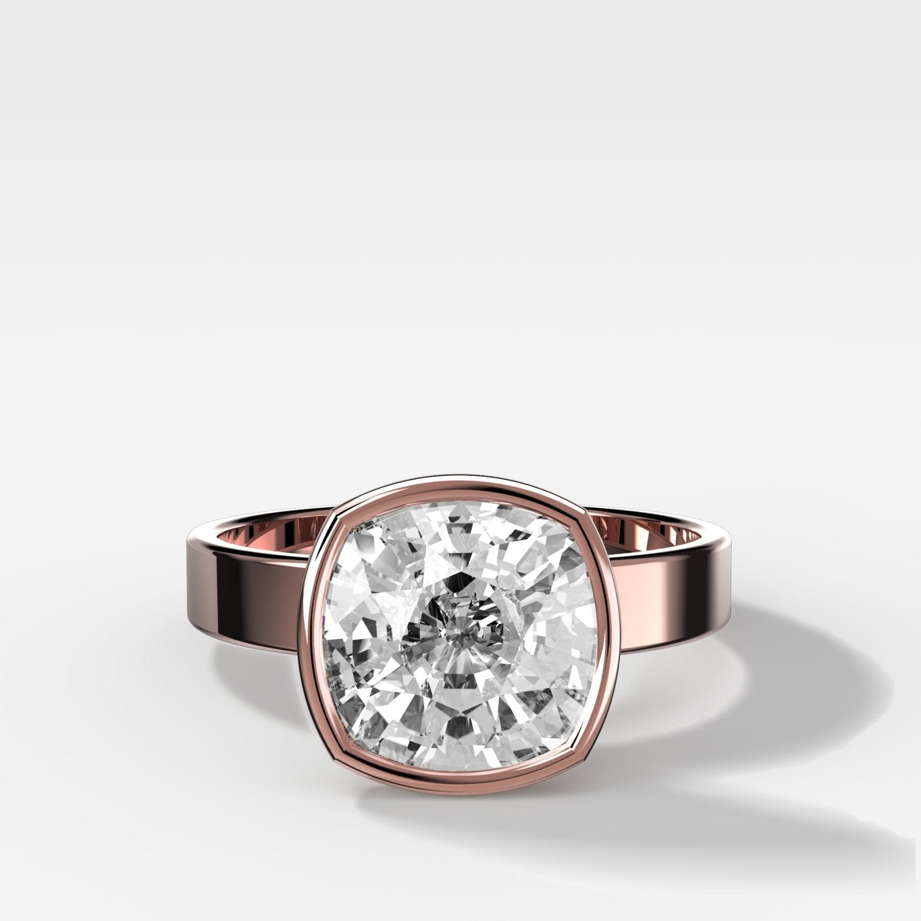 Finest Bezel Set Engagement Ring With Cushion Cut Diamond