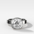 Finest Bezel Set Engagement Ring With Cushion Cut Diamond