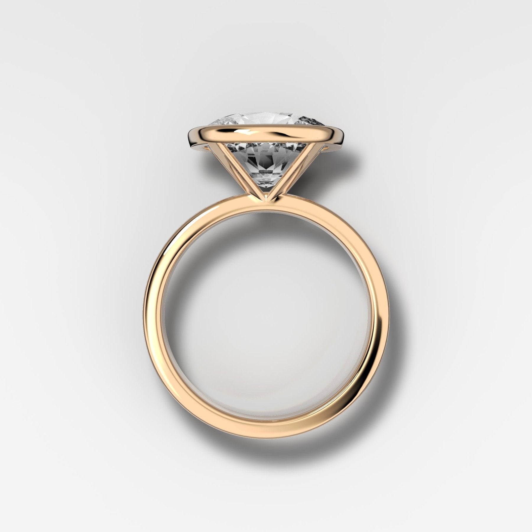 Finest Bezel Set Engagement Ring With East West Elongated Cushion Cut Diamond