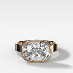 Finest Bezel Set Engagement Ring With East West Elongated Cushion Cut Diamond