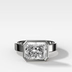 Finest Bezel Set Engagement Ring With East West Elongated Radiant Cut Diamond