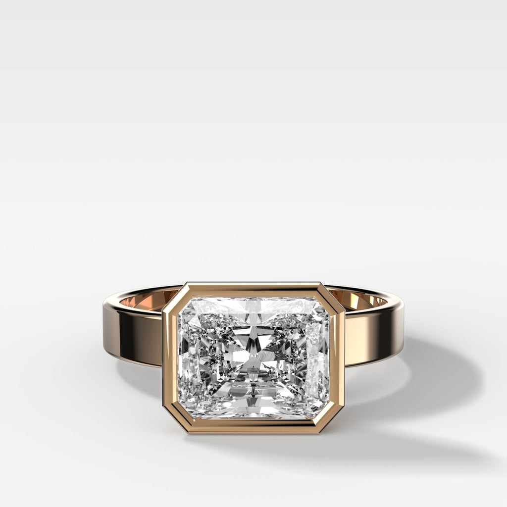 Finest Bezel Set Engagement Ring With East West Elongated Radiant Cut Diamond