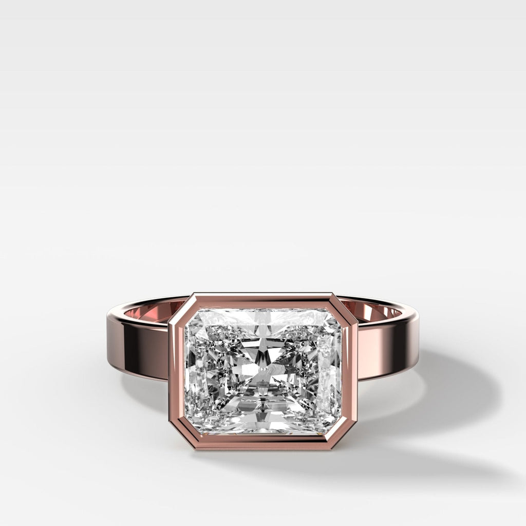 Finest Bezel Set Engagement Ring With East West Elongated Radiant Cut Diamond
