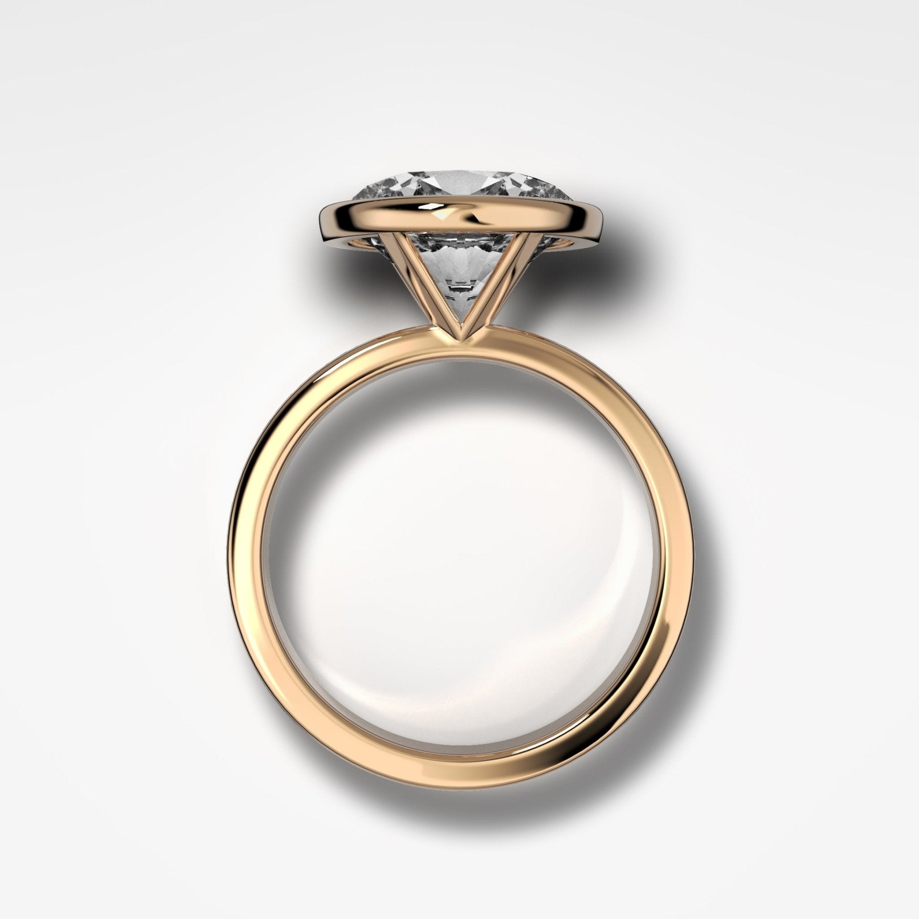 Finest Bezel Set Engagement Ring With East West Oval Cut Diamond