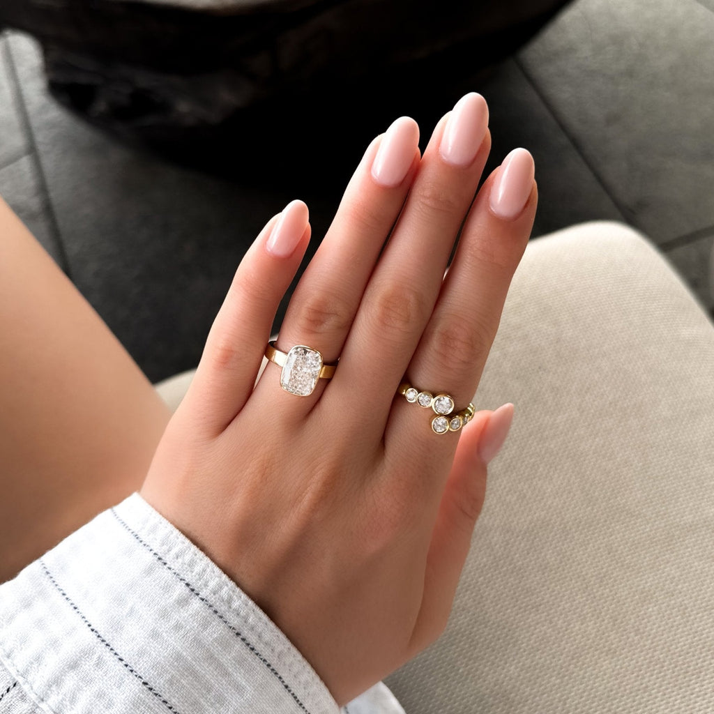 Finest Bezel Set Engagement Ring With Elongated Cushion Cut Diamond