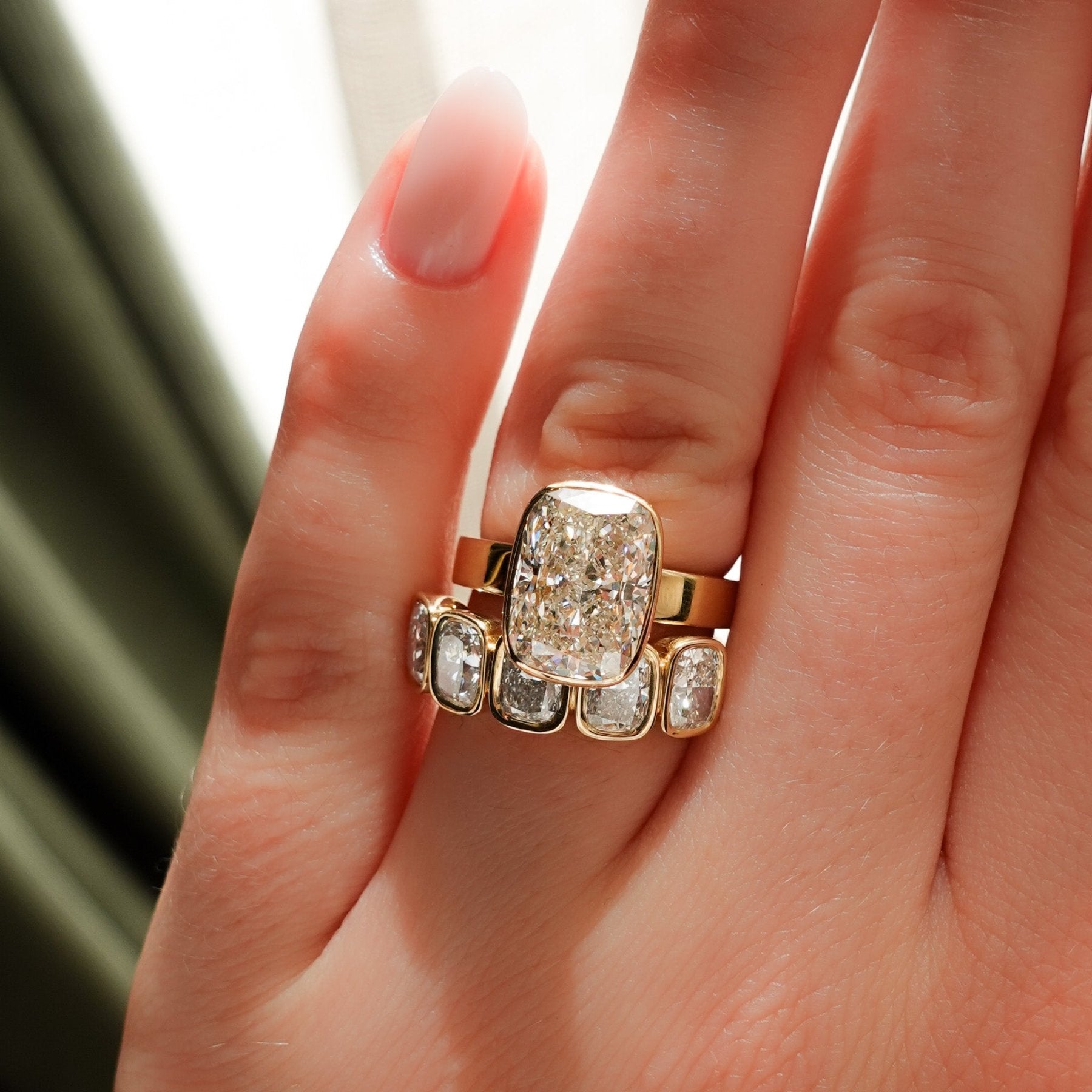 Finest Bezel Set Engagement Ring With Elongated Cushion Cut Diamond