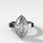 Finest Bezel Set Engagement Ring With Marquise Cut Diamond