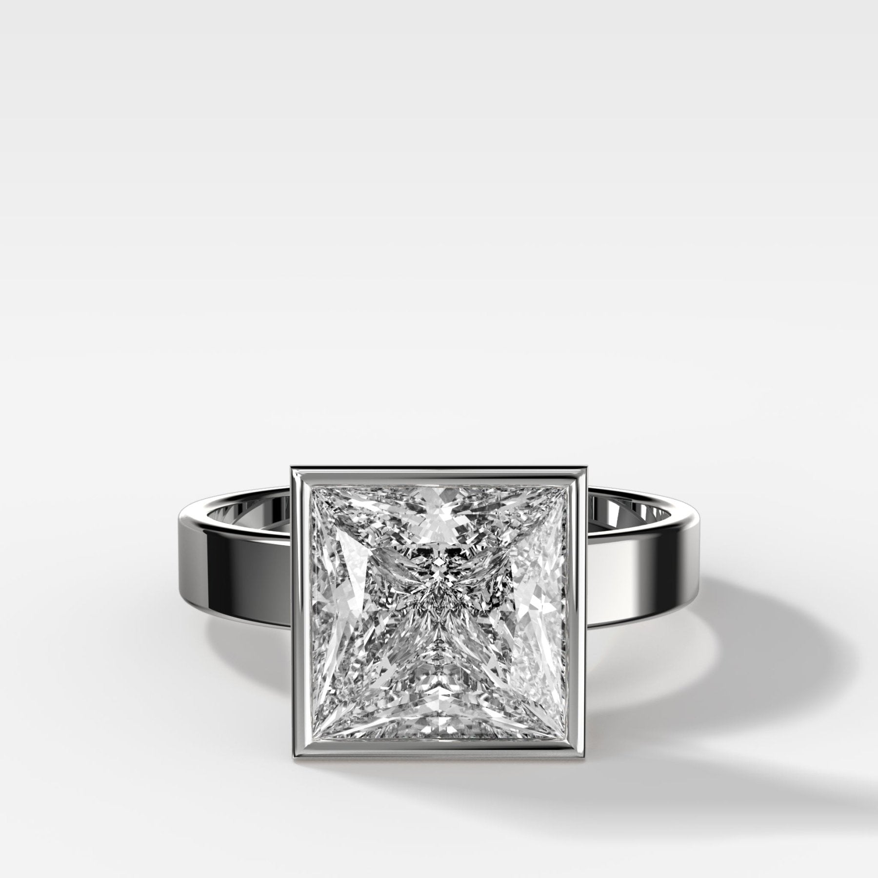 Finest Bezel Set Engagement Ring With Princess Cut Diamond