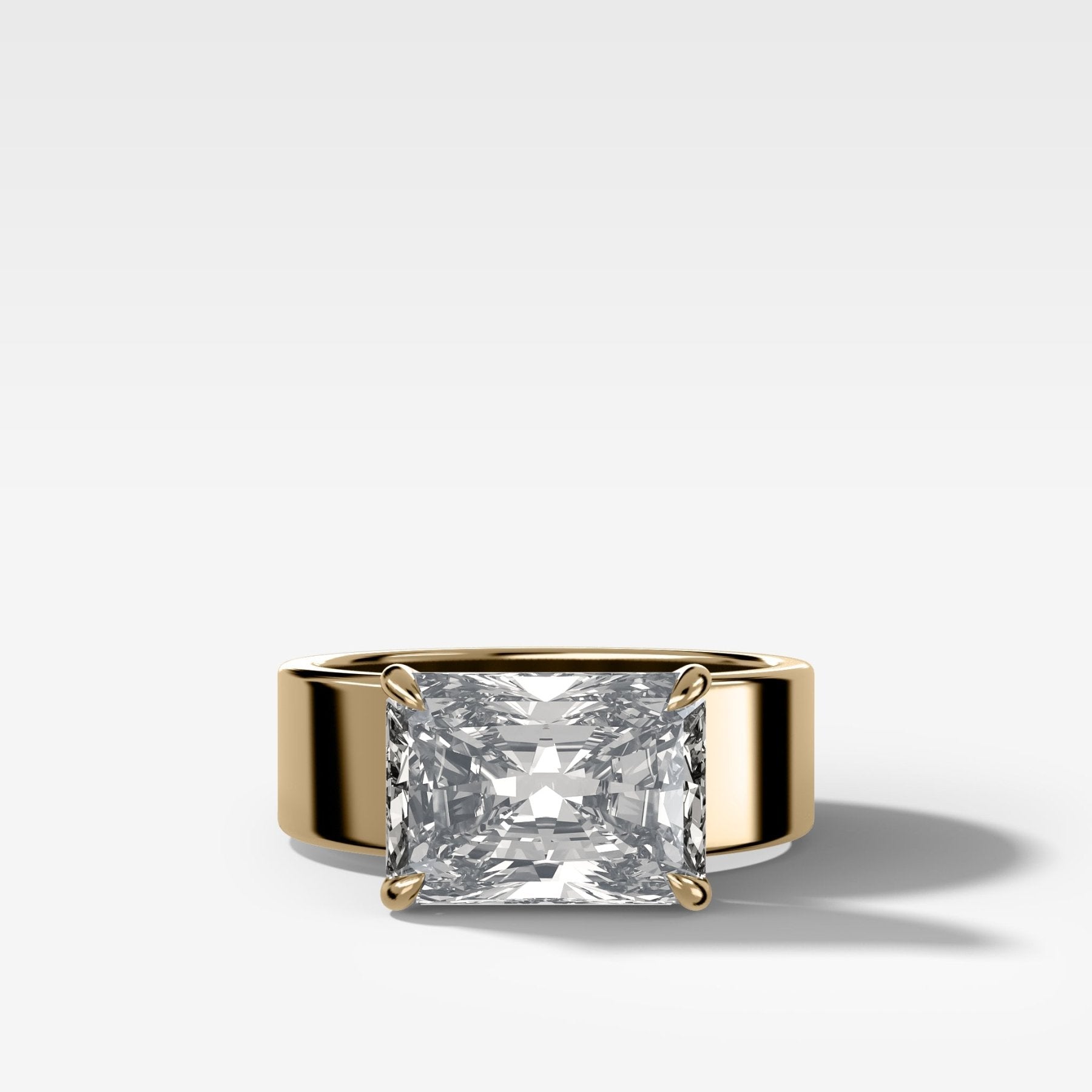 Finest Cigar Band Engagement Ring with East West Elongated Radiant Cut Diamond
