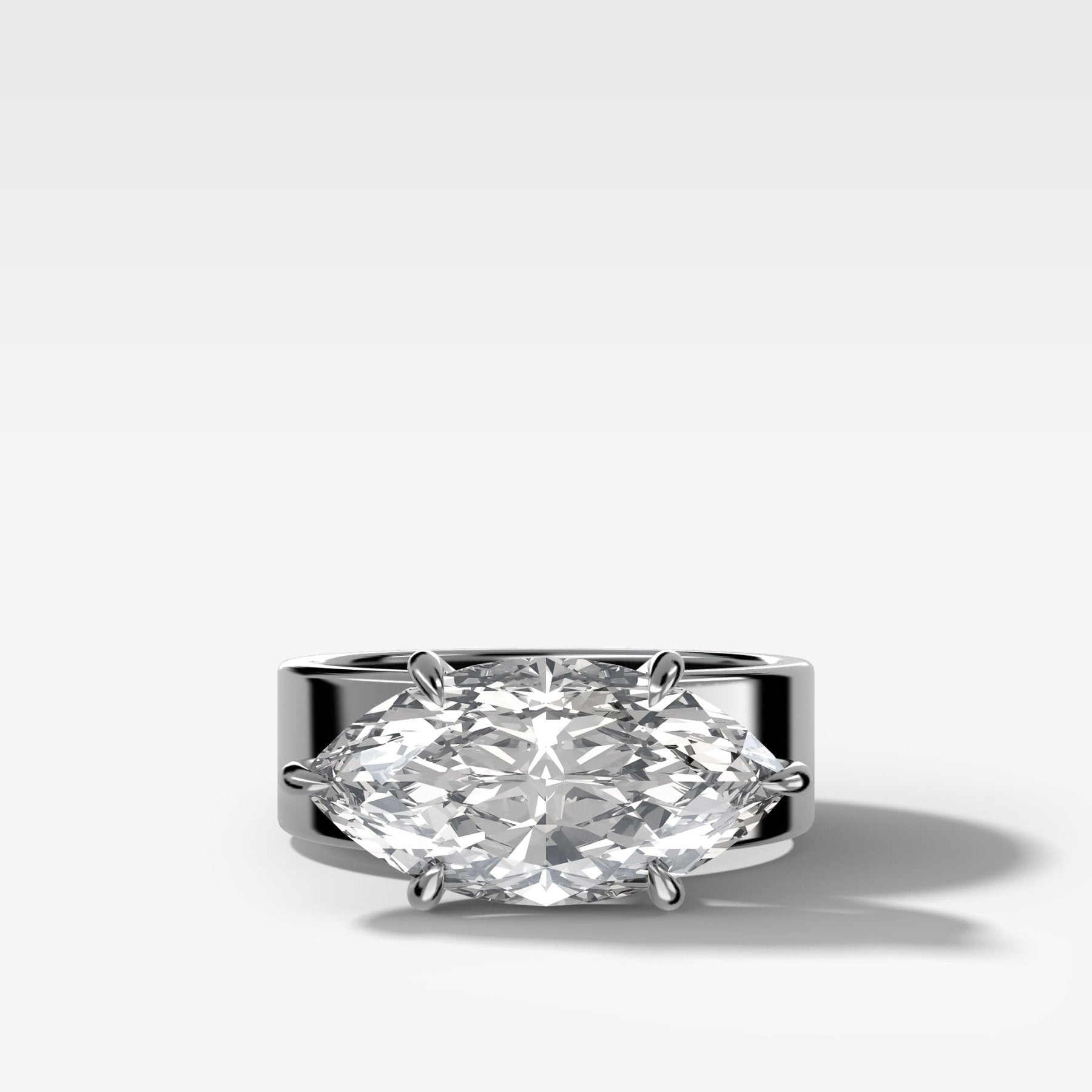 Finest Cigar Band Engagement Ring with East West Marquise Cut Diamond