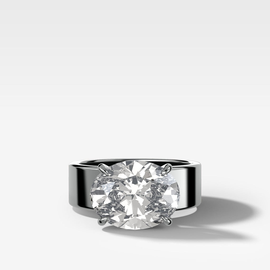 Finest Cigar Band Engagement Ring with East West Oval Cut Diamond