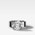 Finest Cigar Band Engagement Ring with East West Oval Cut Diamond