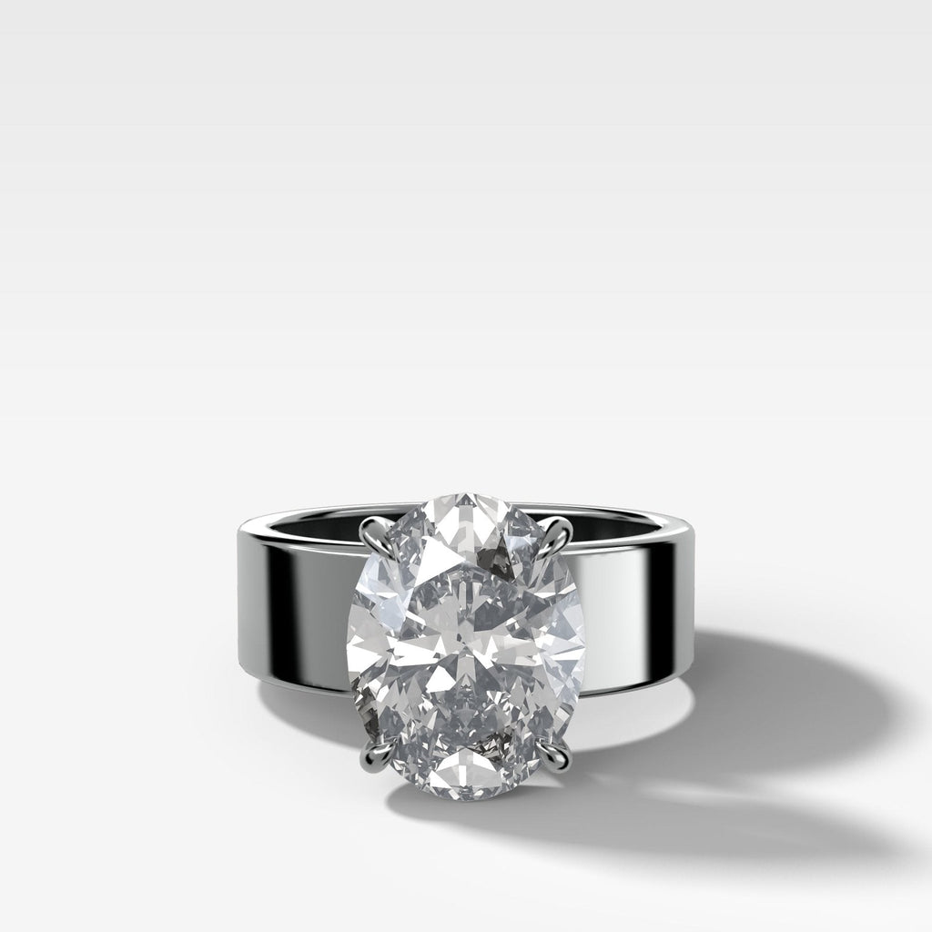 Finest Cigar Band Engagement Ring with Oval Cut Diamond