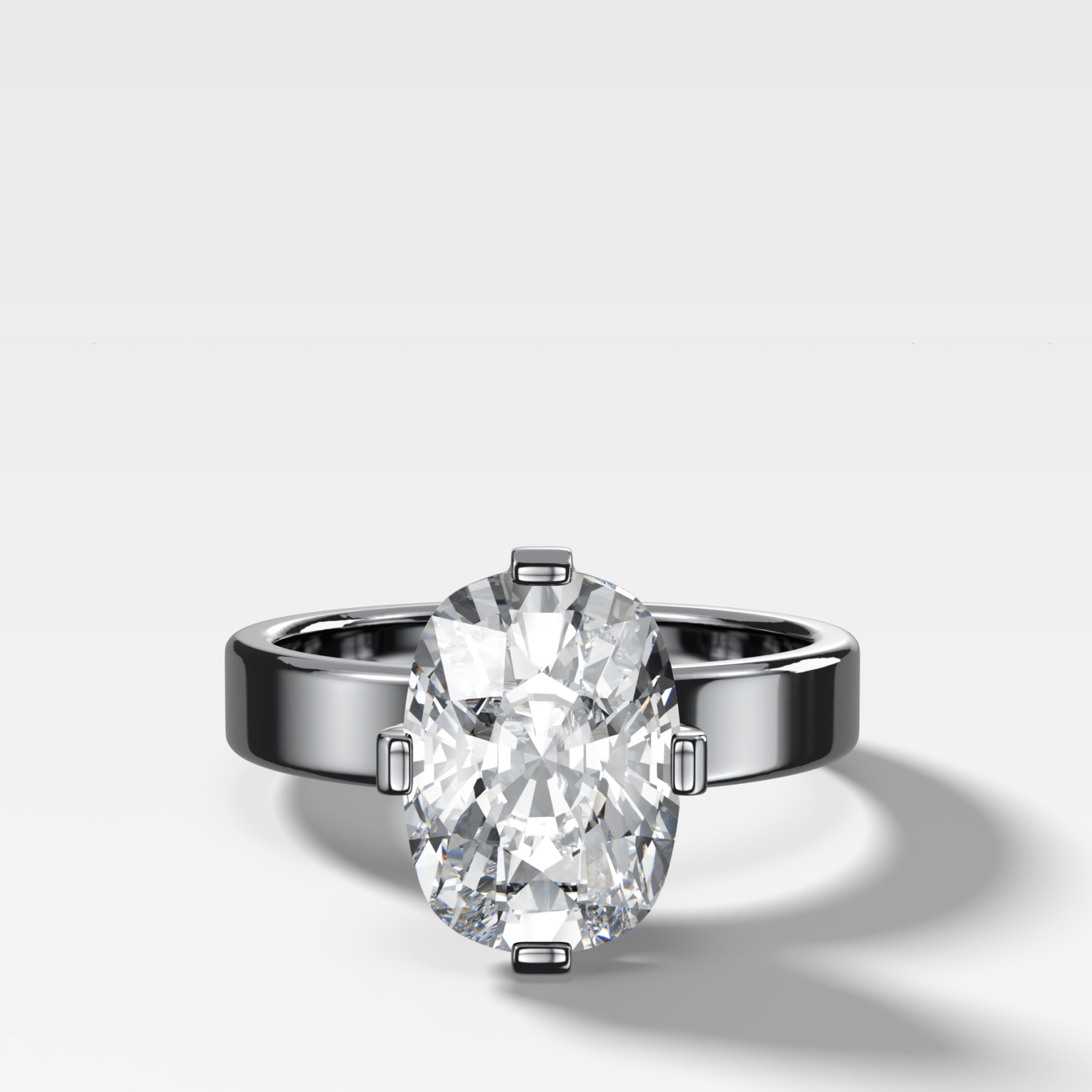 Finest Compass Solitaire Engagement Ring with Elongated Cushion Cut Diamond