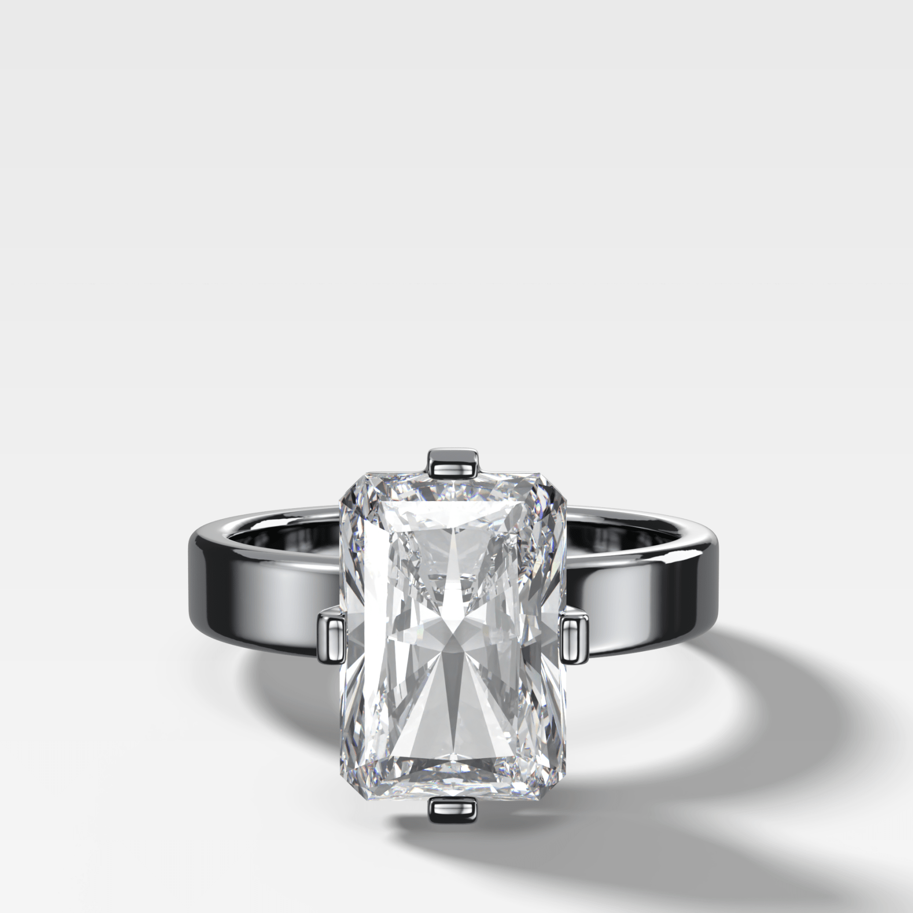 Finest Compass Solitaire Engagement Ring with Elongated Radiant Cut Diamond