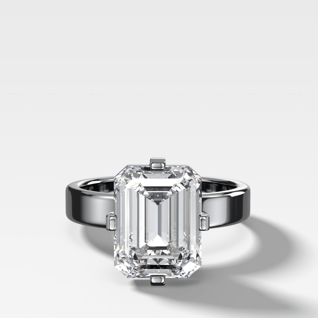 Finest Compass Solitaire Engagement Ring with Emerald Cut Diamond
