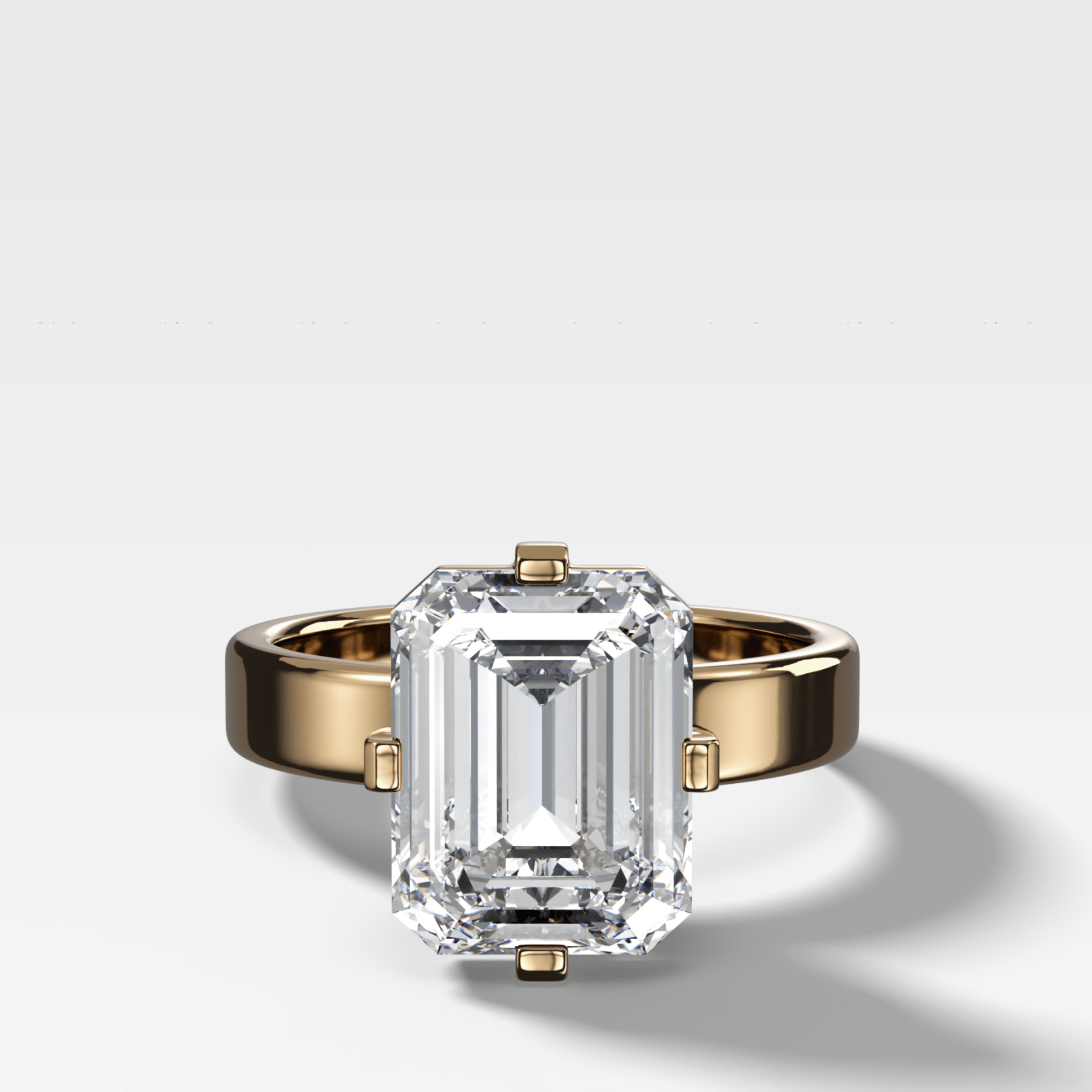 Finest Compass Solitaire Engagement Ring with Emerald Cut Diamond