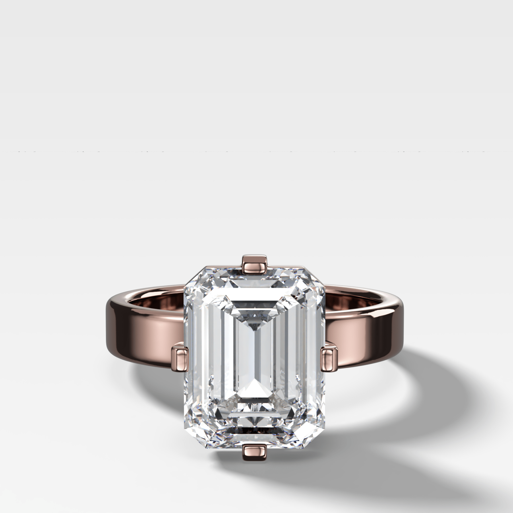 Finest Compass Solitaire Engagement Ring with Emerald Cut Diamond