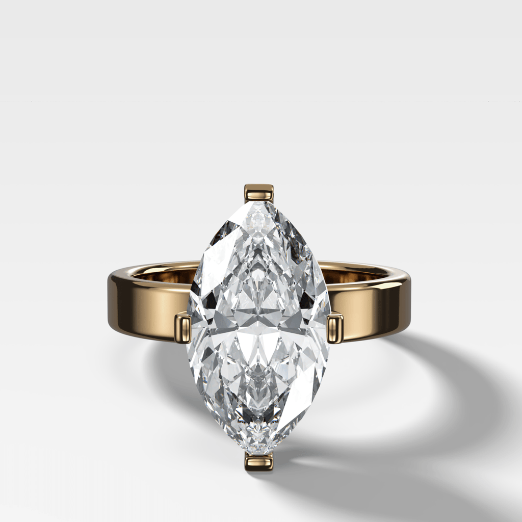 Finest Compass Solitaire Engagement Ring with Marquise Cut Diamond