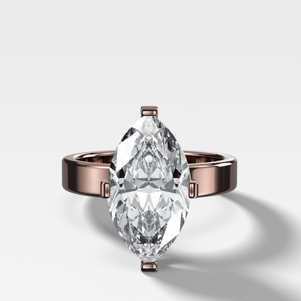 Finest Compass Solitaire Engagement Ring with Marquise Cut Diamond