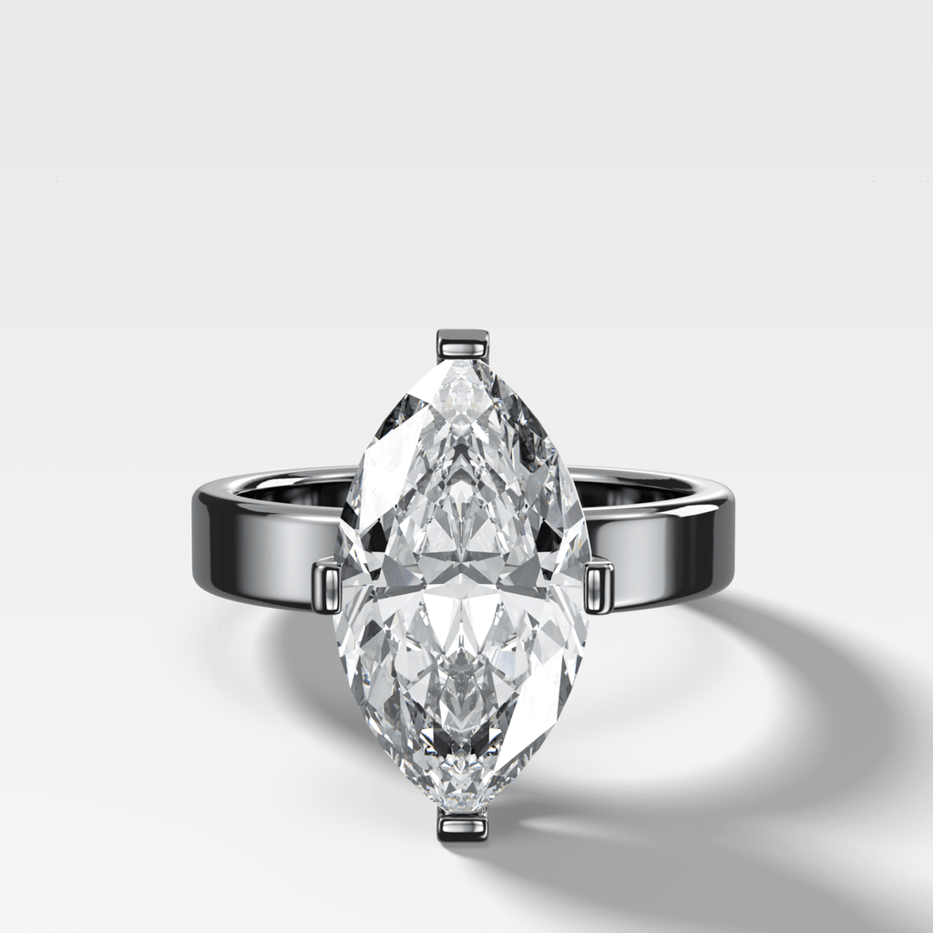 Finest Compass Solitaire Engagement Ring with Marquise Cut Diamond