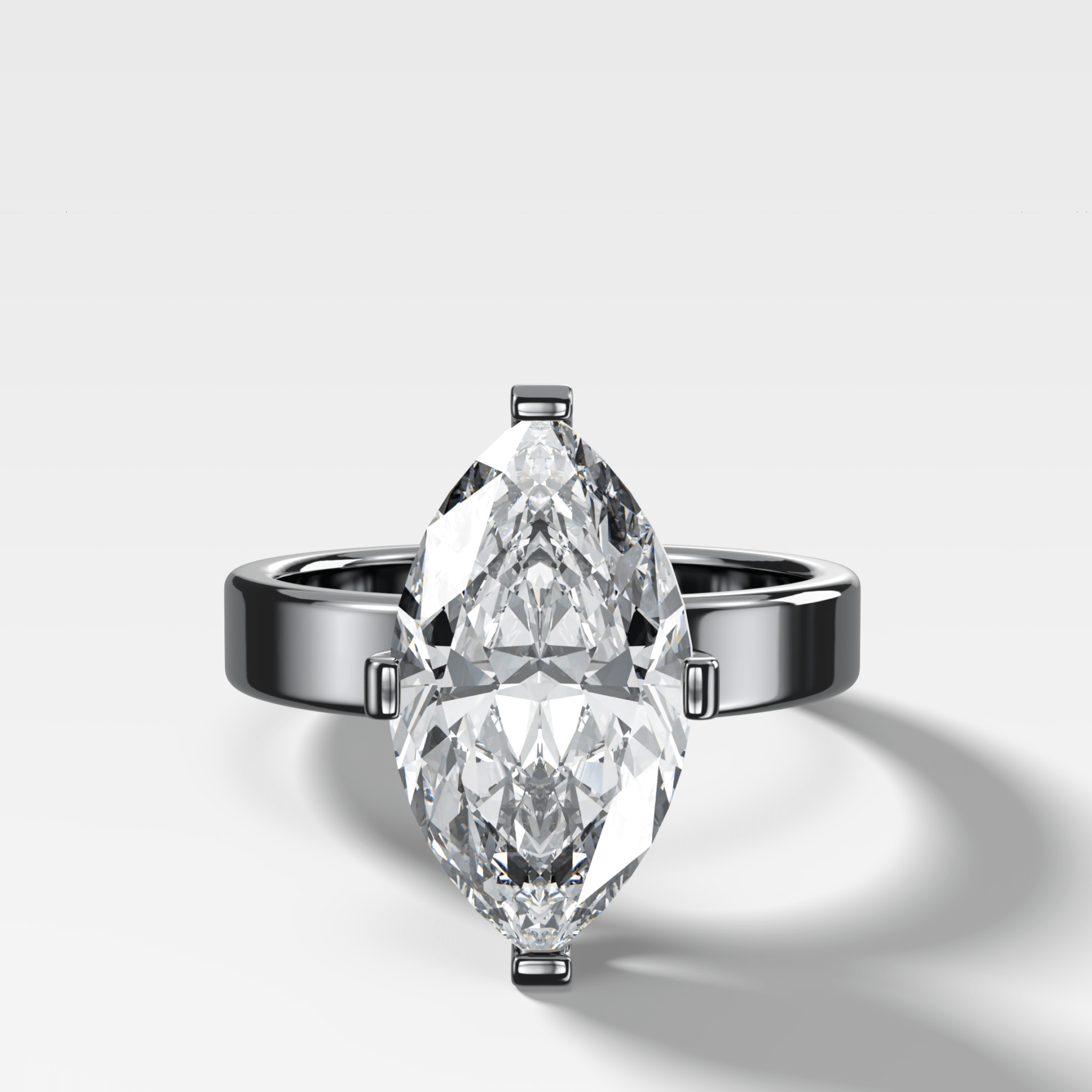 Finest Compass Solitaire Engagement Ring with Marquise Cut Diamond