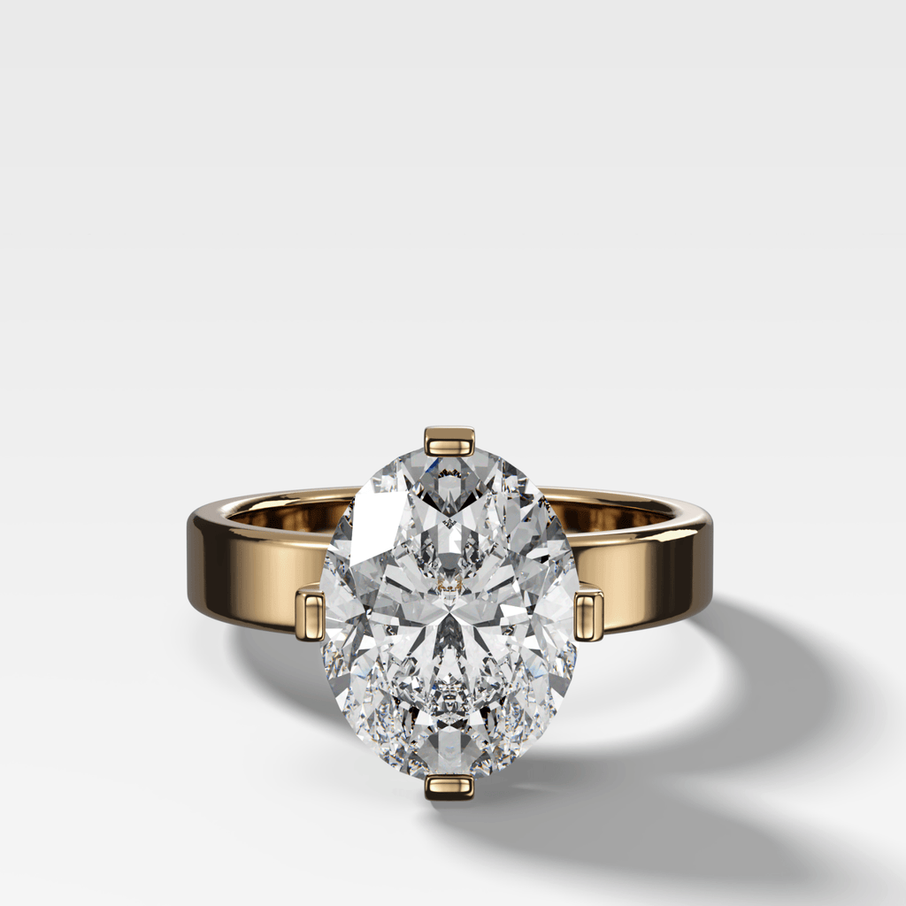 Finest Compass Solitaire Engagement Ring with Oval Cut Diamond