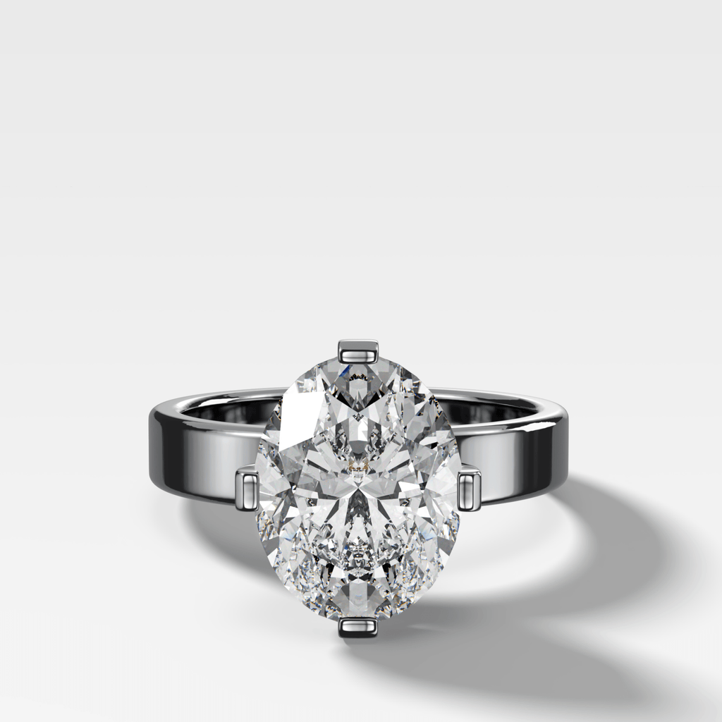 Finest Compass Solitaire Engagement Ring with Oval Cut Diamond