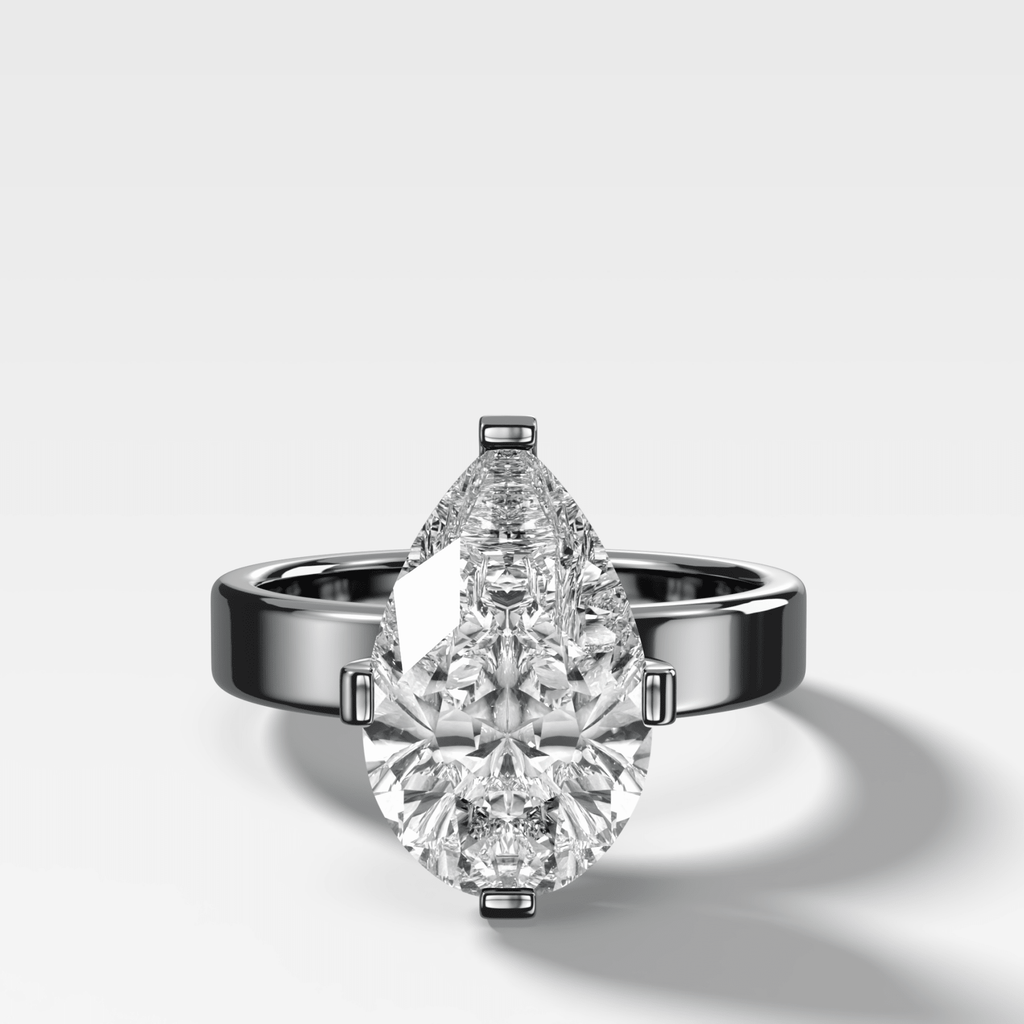 Finest Compass Solitaire Engagement Ring with Pear Cut Diamond