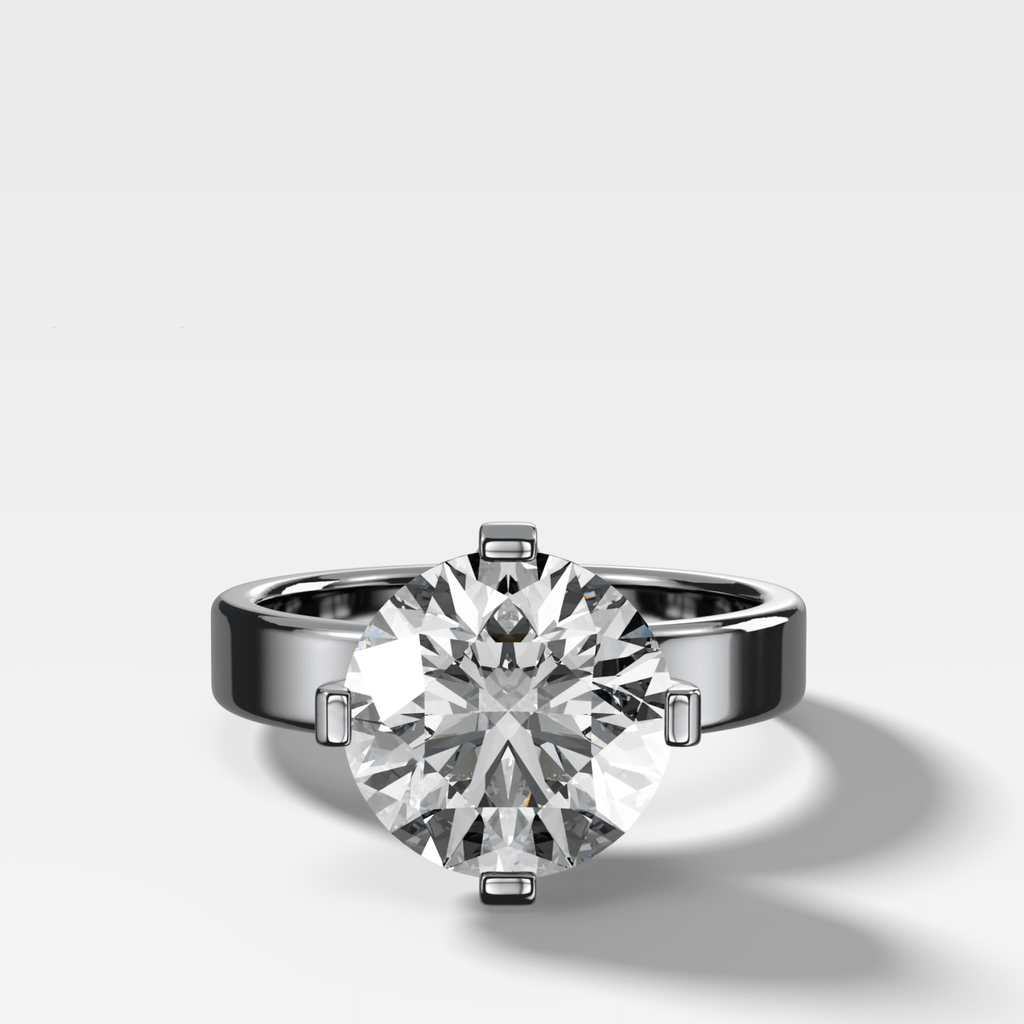 Finest Compass Solitaire Engagement Ring with Round Cut Diamond
