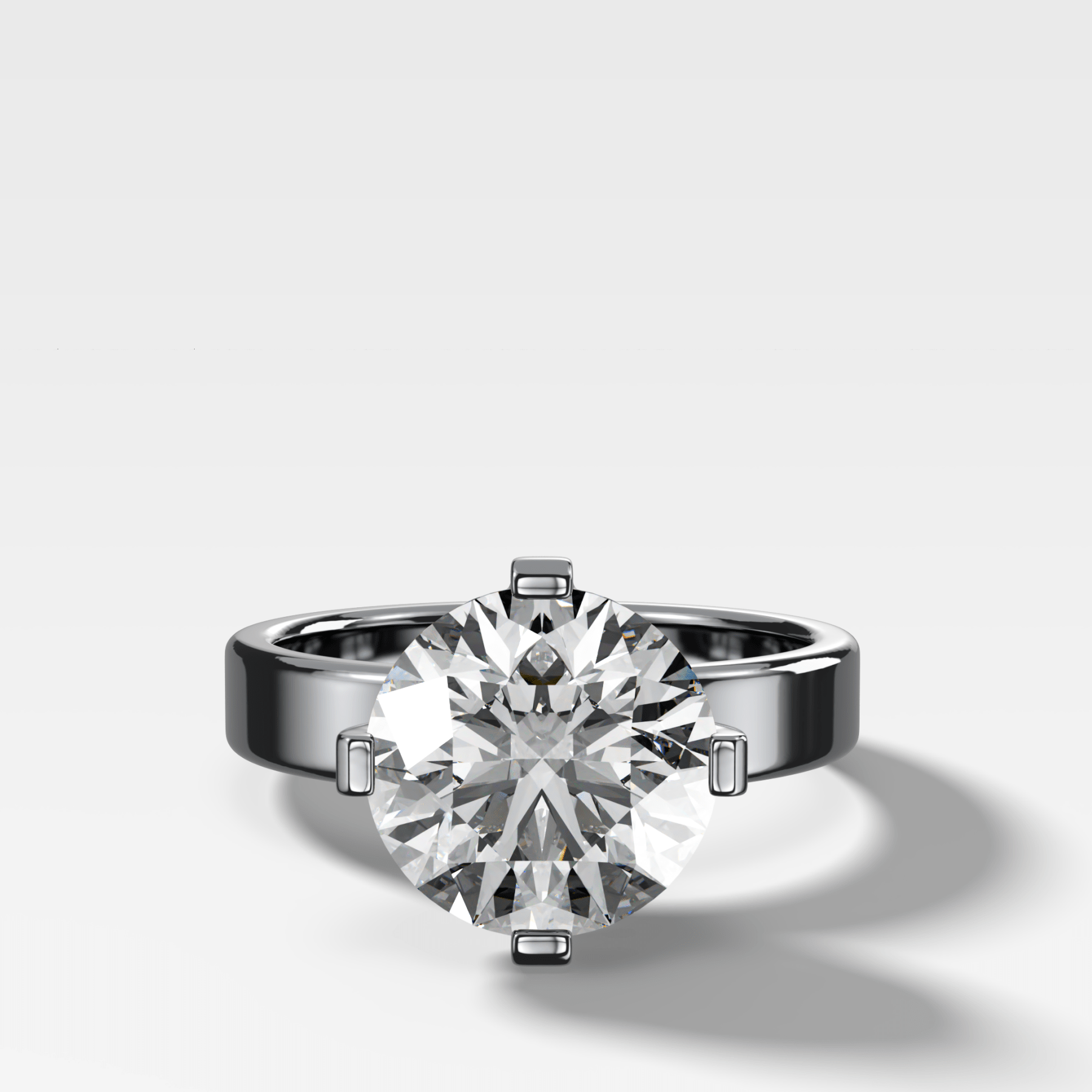 Finest Compass Solitaire Engagement Ring with Round Cut Diamond
