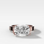 Finest Half Bezel Solitaire Engagement Ring With East West Elongated Cushion Cut Diamond