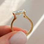 Finest Half Bezel Solitaire Engagement Ring With East West Elongated Radiant Cut Diamond