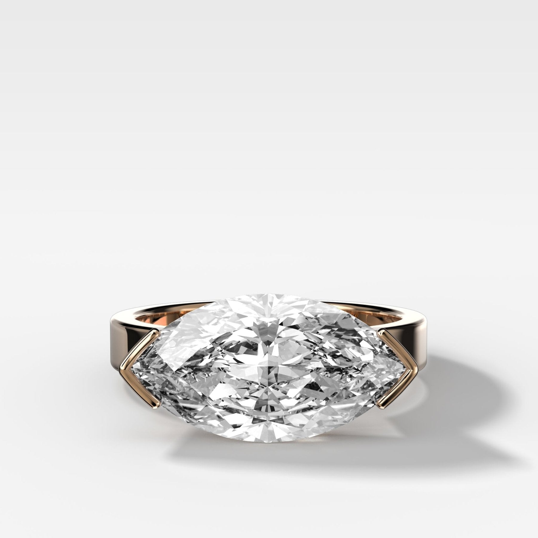 Finest Half Bezel Solitaire Engagement Ring With East West Marquise Cut Diamond