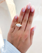 Finest Half Bezel Solitaire Engagement Ring With East West Marquise Cut Diamond