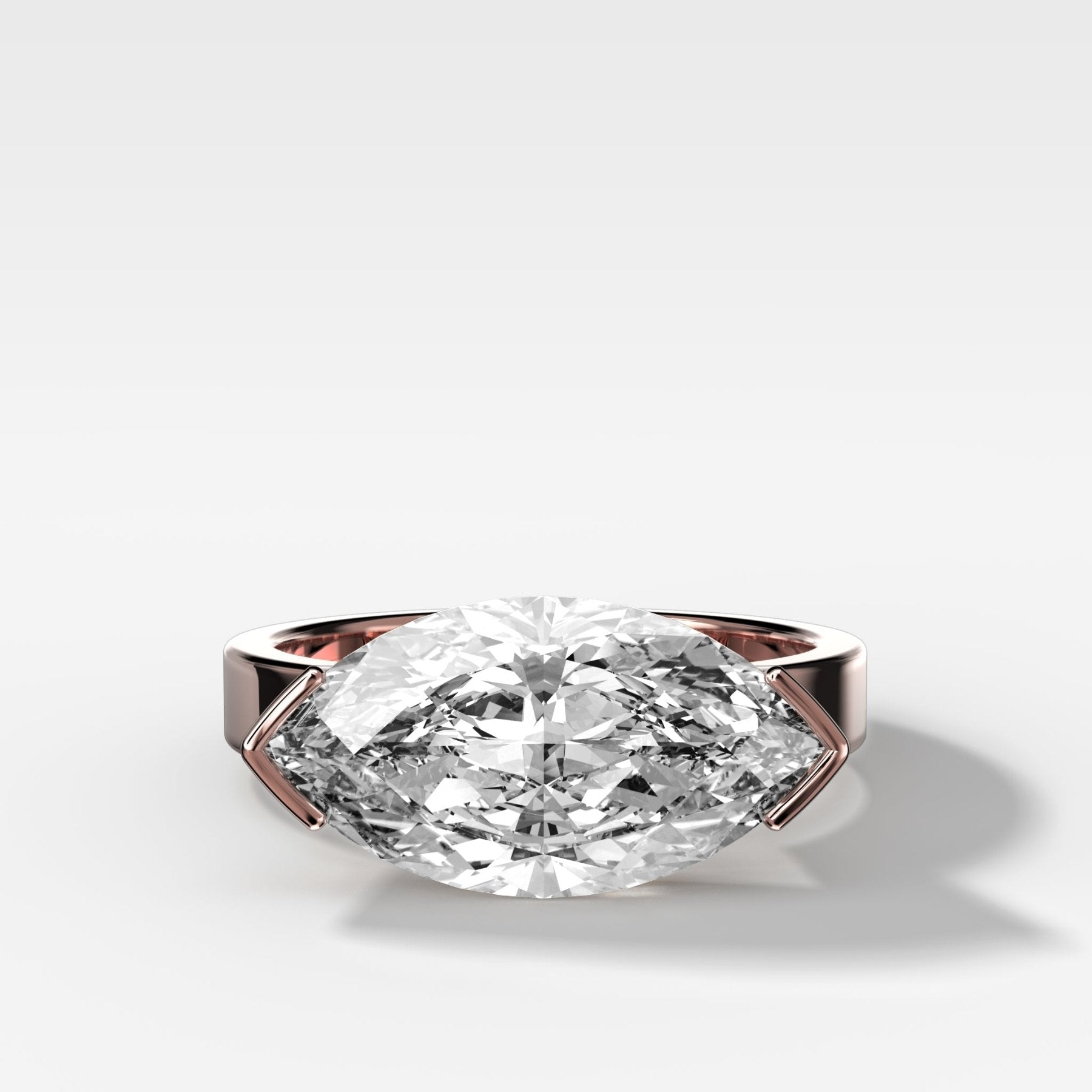 Finest Half Bezel Solitaire Engagement Ring With East West Marquise Cut Diamond