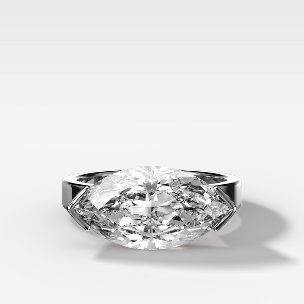 Finest Half Bezel Solitaire Engagement Ring With East West Marquise Cut Diamond