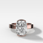 Finest Half Bezel Solitaire Engagement Ring With Elongated Cushion Cut Diamond