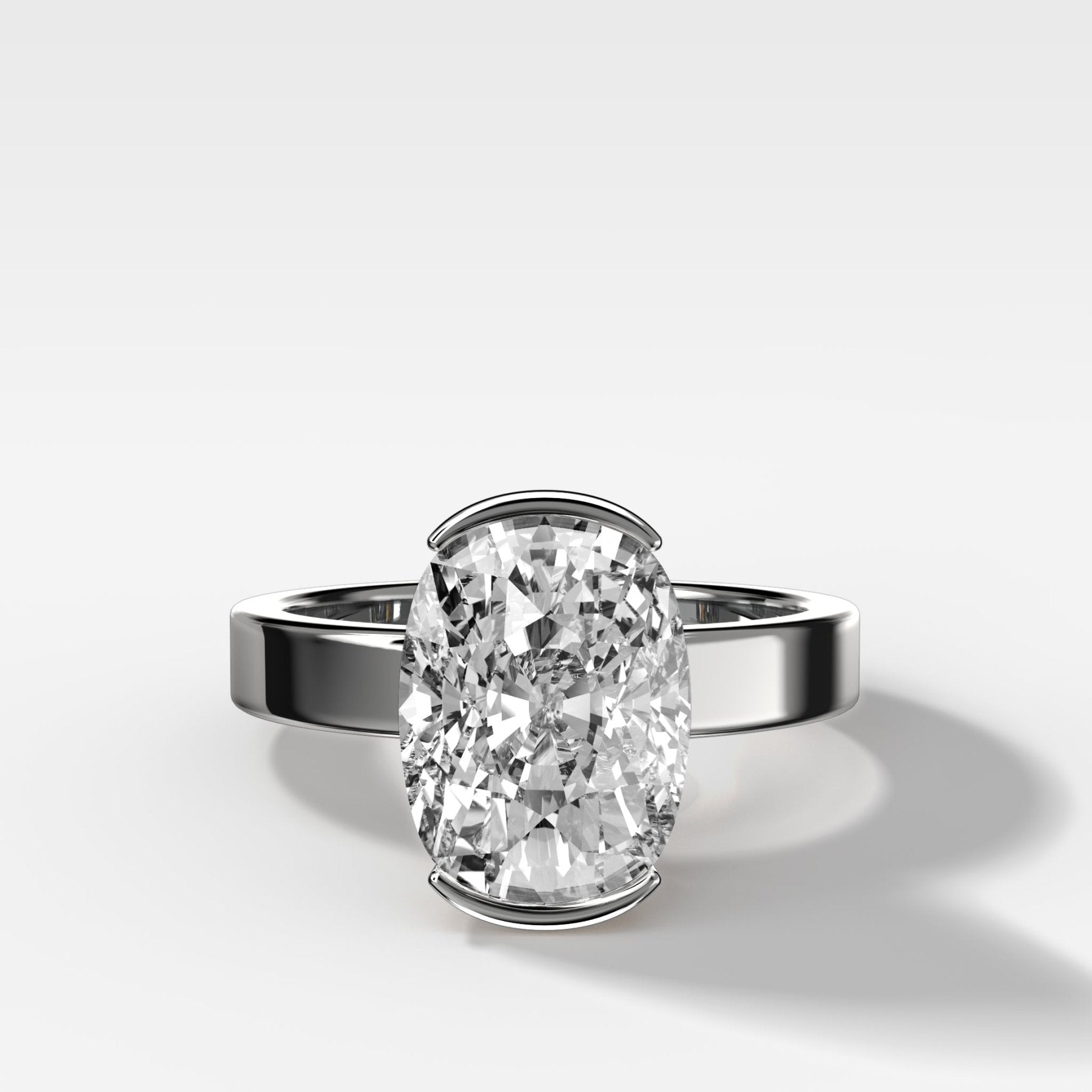 Finest Half Bezel Solitaire Engagement Ring With Elongated Cushion Cut Diamond