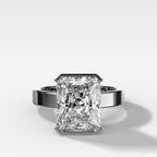 Finest Half Bezel Solitaire Engagement Ring With Elongated Radiant Cut Diamond