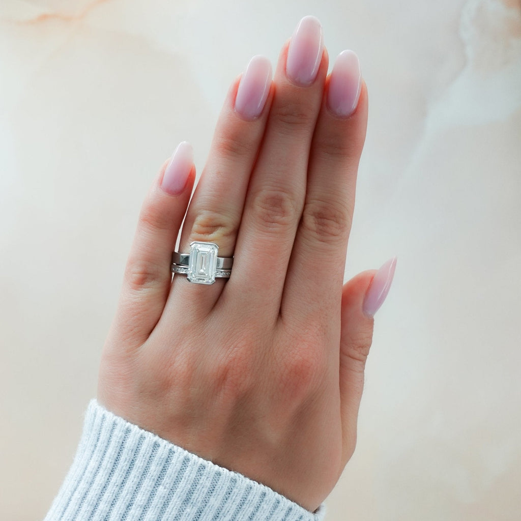 Finest Half Bezel Solitaire Engagement Ring With Emerald Cut Diamond