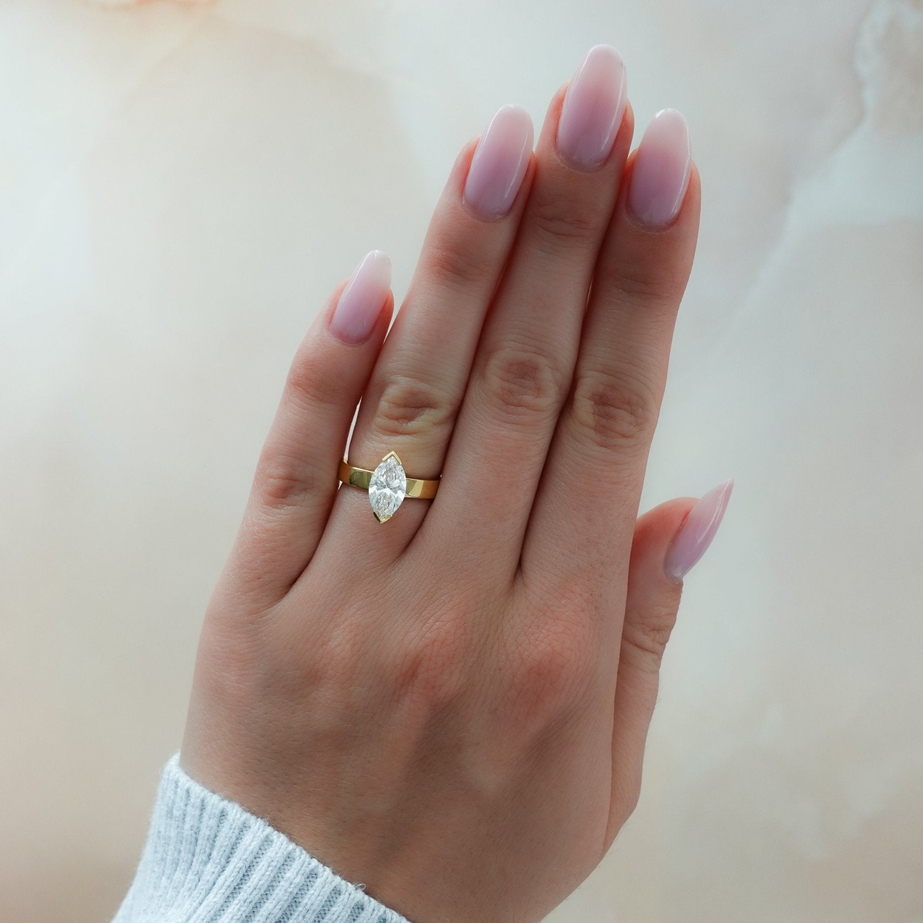 Finest Half Bezel Solitaire Engagement Ring With Marquise Cut Diamond
