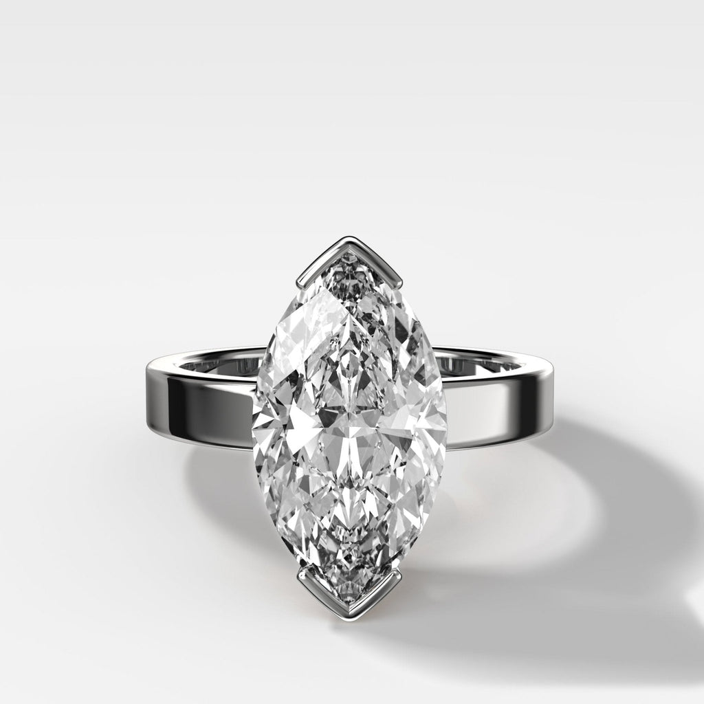Finest Half Bezel Solitaire Engagement Ring With Marquise Cut Diamond