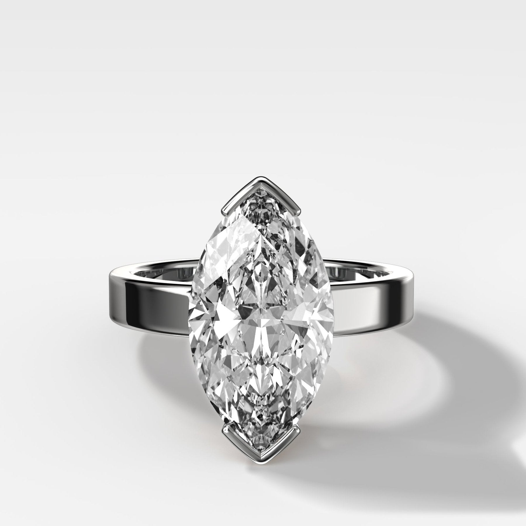 Finest Half Bezel Solitaire Engagement Ring With Marquise Cut Diamond
