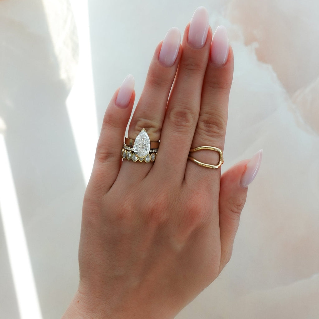 Finest Half Bezel Solitaire Engagement Ring With Pear Cut Diamond