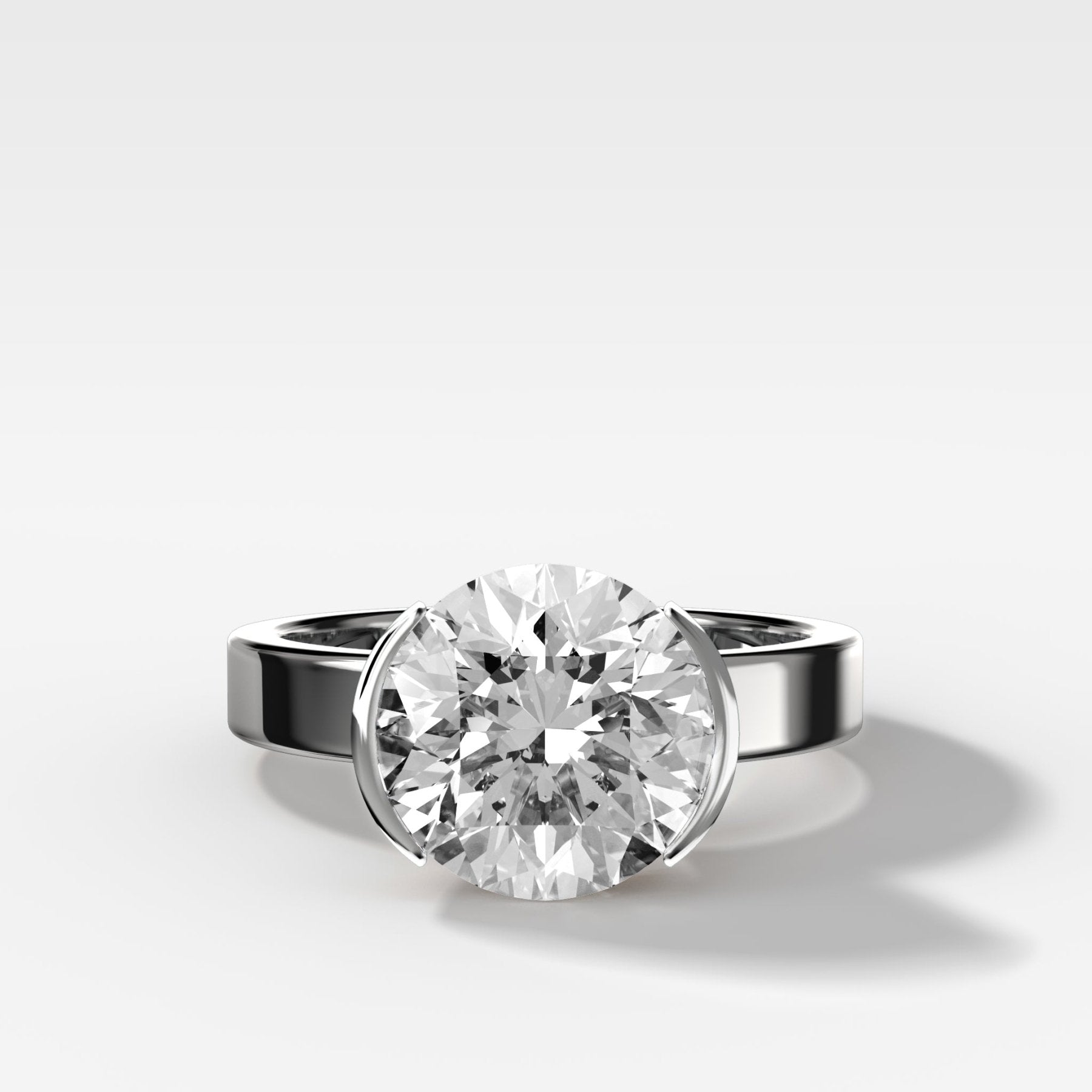 Finest Half Bezel Solitaire Engagement Ring With Round Cut Diamond