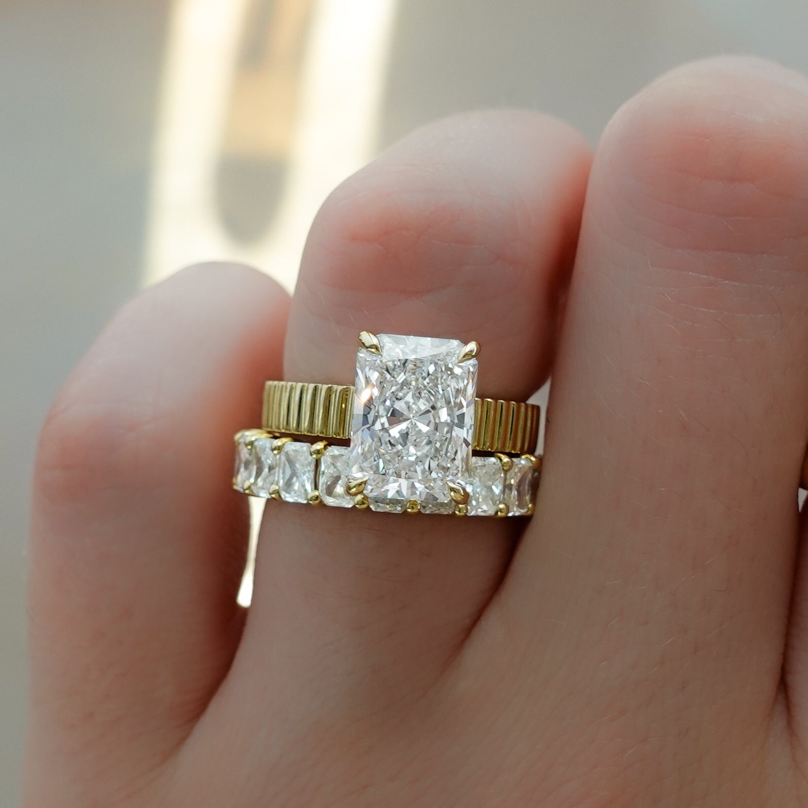 Finest Ridged Solitaire Engagement Ring With Elongated Radiant Cut Diamond