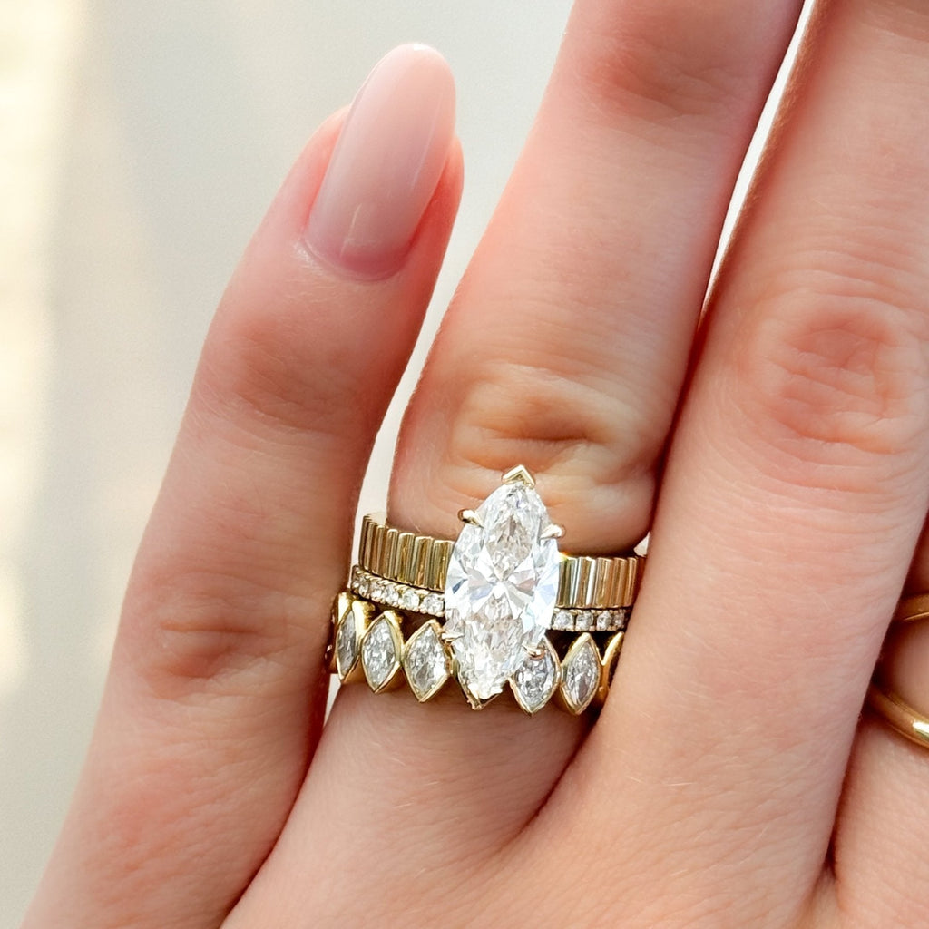 Finest Ridged Solitaire Engagement Ring With Marquise Cut Diamond