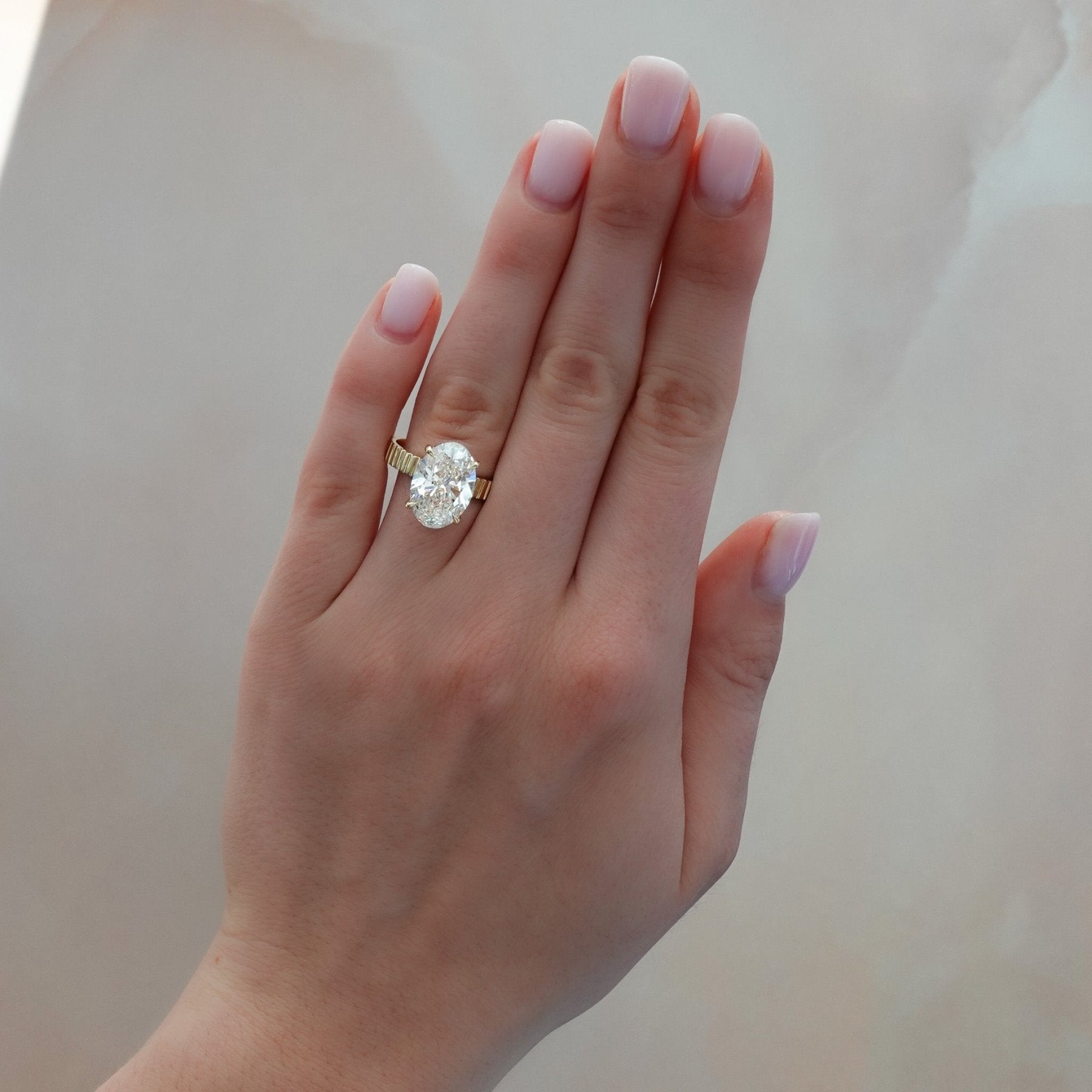Finest Ridged Solitaire Engagement Ring With Oval Cut Diamond